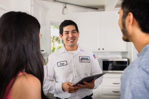 Diego from SouthSota speaking with homeowners about their plumbing
