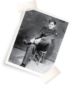 Old photo of a veteran sitting in a chair